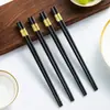 Palillos de aleación de alta gama, antideslizantes, duraderos y estéticamente agradables, perfectos para restaurantes y esenciales para el uso doméstico
