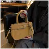 Bolso único y elegante para mujer, nuevo modelo de moda 2026, versátil bolso de hombro y cruzado, bolso cuadrado pequeño de alta calidad