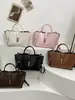 Bolsa tote de gran capacidad transfronteriza para mujer, nuevo estilo 2026, retro, versátil, bolso de hombro para el trabajo, bolso de axila y bolso para mamá