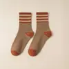 Nuevos Calcetines de Otoño e Invierno para Hombres y Mujeres Calcetines Gruesos Cálidos con Forro de Felpa Japonés calcetines de toalla de piso de tres rayas de rizo calcetines de tubo medio