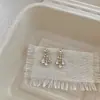 Pendientes Minimalistas Únicos y Sofisticados con un Toque de Alta Gama, Presentando una Personalidad Pequeña, Sencilla, Moderna, Versátil y Adornados con Diamantes y Borlas de Gota de Agua