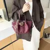 Bolso tipo cubo informal de gran capacidad 2026, bolso versátil para mujer, nuevo y elegante bolso de hombro de ante para el día a día, simple y retro