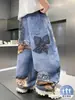 Pantalones Vaqueros de Verano para Niños 2026 Nuevo Modelo para Niños Mayores Pantalones con Estampado Digital de Niños Pantalones Casuales de Verano Modernos