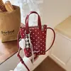 Bolso de mano nuevo de lunares, bolso para teléfono estampado, bolso de nicho estilo coreano, bolso de hombro de moda para el día a día para niñas, bolso cruzado