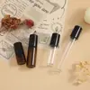 Botella roller de vidrio ámbar multiespecificación tapa negra botella roller para aceite esencial perfume bloqueo de luz portátil muestra botella vacía