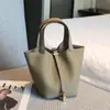 Bolsa Saco de Couro Bovino de Primeira Camada 2026 Nova Versátil Bolsa Tote de Couro Genuíno Bolsa Feminina Bolsa de Mão de Alta Qualidade