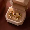 Aretes Maillard Fuego Artificial Dorado Ojo de Tigre Populares Elegantes Accesibles Joyería de Lujo Estilo Fresco de Gama Alta Aretes Únicos