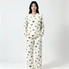 Pijama a la ModaNuevo pijama para mujer, imitación algodón, doble bolsillo, cuello redondo, manga larga, diseño de dibujos animados, conjunto holgado para casa para primavera y otoño