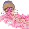 Venta al por mayor Rattan de Flor de Cerezo Simulada Enredadera Envuelta en Tubería de Aire Acondicionado Tiras de Flores Flores Falsas de Plástico Decoración de Bloqueo de Techo de Boda