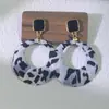 Europeu e americano retro leopardo impressão tecido enrolamento círculo aço agulha brincos personalidade geométrica temperamento alto sentido brincos mulheres atacado