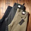 Estación europea otoño e invierno algodón grueso elástico lavado pantalones para hombre cintura media rectos holgados pantalones casuales de negocios para hombre