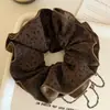 Diadema Retro con Estampado de Leopardo para Mujer 2025 Nueva Diadema de Bola de Gama Alta Cuerda para Cola de Caballo Alta para Atar el Cabello Flor en la Cabeza
