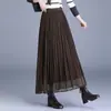 Falda midi plisada taiwanesa con una textura distintiva, nuevo estilo otoño/invierno 2026, con efecto de caída, elegancia veraniega, longitud media