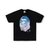 Comercio exterior al por mayor transfronterizo marca de tendencia estilo japonés camuflaje tiburón, cabeza de tigre, hombre-mono bloques de color luminoso manga corta corte holgado camiseta de pareja