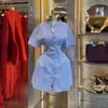 Ropa Femenina Transfronteriza Europea y Americana 2026 Primavera Nuevo Estilo Elegante y a la Moda Vestido Camisa Azul Rayado Ajustado de Manga Corta