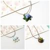 Collar colgante de cerámica fresca estilo ins japonés y coreano simple versátil elegante retro orquídea cadena clavicular cadena larga femenina