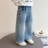 Calça Jeans Feminina Primavera e Outono 2026 Novo Estilo Roupas de Outono Estilosas para Crianças Calças Bebê Moda Casual Outono Calças de Perna Larga