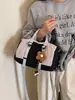 Bolso tipo Boston casual ligero de dos tonos 2026 nuevo versátil moda de invierno bandolera y de hombro