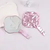 Espejo de mano con textura de onda de agua irregular, espejo de maquillaje con mango texturizado tipo nube de lujo ligero, stock de fábrica disponible para personalización