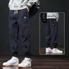 Pantalones de Deportes de Invierno al por Mayor Pana de Peso Pesado Pantalones de Hombre Engrosados con Forro Polar Cálidos para Hombre Casual Versátiles Pantalones de Correr