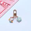 Lindo llavero de Sanrio Hello kitty accesorios para bolso flor colgante pequeño Taobao producto terminado venta al por mayor