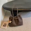Estilo retro ligero, casual, bolsa de mano con estampado de piedra para mujer, gran capacidad, adecuada para otoño, elegante, versátil para ir al trabajo, bolso de hombro o bolso de axila