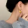 Pendientes Geométricos de Diseño Minimalista de Nicho Moda Transfronteriza Versátiles para el Trayecto Diario Lujo Ligero Sensación de Alta Gama Pendientes Chapados en Cobre Dorado