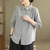Foto real de diseño original de camisa de manga larga con velo para mujer, top de base a rayas de color liso estilo vintage