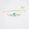 Pulsera tejida a mano de suministro del fabricante Pulsera de narciso seco con hoja verde Joyería de venta caliente transfronteriza fresca y dulce