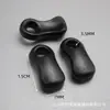 Pequeno atacado plástico preto orelhas grandes furo único orelhas pequenas fivela de cordão orelha de nylon Sino ABS pequena vírgula