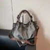 Bolsa Portátil Transfronteriza de Gran Capacidad para Mujer 2025 Nuevo Diseño de Nicho Bolso Tote Bolso Cruzado Simple Moderno