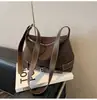 Bolsa Baguete Portátil Retro Coreana para Mulheres Inverno 2025 Nova Bolsa de Ombro Único Transversal Estilo Ocidental com Retalhos de Alta Qualidade