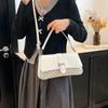 2025 primavera y verano nuevo contraste de color de textura bolso cuadrado pequeño retro moda alto valor de color bolso bandolera popular para ir al trabajo bolso de mujer