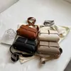 Bolso de moda de alta gama 2026, bolso cruzado versátil de lujo ligero con patrón de lichi, bolso de hombro casual para commuter con diseño de nicho