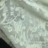 Tecido de renda jacquard elástico para vestidos, tecido de renda amassado para roupas, fabricante de tecido de renda de verão