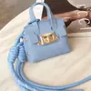 Nuevo Colgante de Bolso Mini Versátil de Platino Llavero de Cuerda Trenzada Multifuncional Portátil para Bolsos Venta al por Mayor