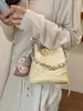 Bolso de mujer de moda 2026 nuevo modelo versátil estilo Chanel con cadena bolso de cubo acolchado para mujer bolso cruzado casual