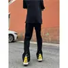 Jeans Retrô Preto com Botões e Fenda High Street Americano para Homens com Design Moderno Calças Slim de Nicho Micro-Flare