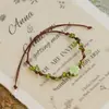 Jingdezhen Navidad Pulsera de Cuerda Trenzada de Cerámica Pulsera de Trébol de Cuatro Hojas Joyería Artística Hecha a Mano Venta al por Mayor Pulseras de Cerámica para Atracciones Turísticas