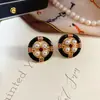 Nuevos Pendientes de Broche Elegantes Simples Estilo Francés Retro Sentido de Antigüedad Esmalte Gota de Aceite Perla Plata 925 para Mujeres