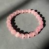 Pulsera de ágata de cristal de ópalo para estudiante puesto de venta al por mayor suministro directo de fábrica pulsera de cuentas redondas de ojo de gato blanco