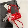 Nova Bolsa de Mão de Nicho Primavera 2026, Bolsa de Mão para Mulheres, Alto Valor Estético, Bolsa Cilíndrica de Bolinhas Levemente Luxuosa, Bolsa Pequena Transversal