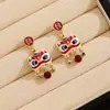 Pendientes Festivos de Borla Despertar del León Rojo con Diseño Asimétrico, Elegantes de Año Nuevo, Joyería para Orejas Única de Nicho de Gama Alta