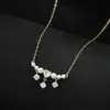 Outono e inverno Novo Estilo Micro cravejado com zircônia corrente de suéter elegante feminina design de nicho sentido pingente de gota d'água corrente de clavícula colar versátil