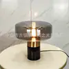 Lámpara de mesa de lujo ligero post-moderna nórdica para sala de estar, lámpara de escritorio de diseñador de vidrio simple para estudio, dormitorio y decoración de mesita de noche