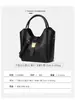 Bolso de mano transfronterizo hecho de piel de vaca de capa superior, bolso de mano para el trabajo, venta al por mayor de comercio exterior, bolso tipo cubo moderno y versátil, bolso personalizado OEM