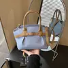 Bolsa de Mão Vintage Plissada Texturizada Nova da Moda Primavera 2026 Bolsa Tote Feminina Bolsa Transversal Versátil