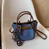 Bolso de Hombro Individual de Textura de Alta Calidad a la Moda para el Trabajo Nuevo Otoño 2026 Versátil Bolso Cubo Elegante Bolso de Mano Cruzado de Moda