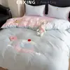 Estilo fresco y sencillo, juego de ropa de cama de cuatro piezas bordado de toalla de algodón lavado, funda de edredón de algodón puro, juego de sábanas de tres piezas para dormitorio de estudiante