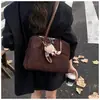 Bolsa Grande Capacidade Feminina 2026 Nova Retrô Nicho Casual Bolsa de Ombro Toque de Luxo Trabalho Deslocamento Bolsa Almofada